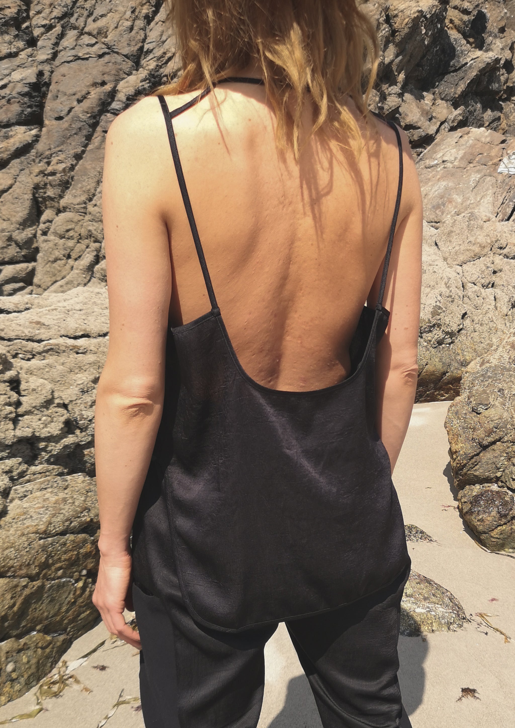 Black spaghetti hotsell strap shirt