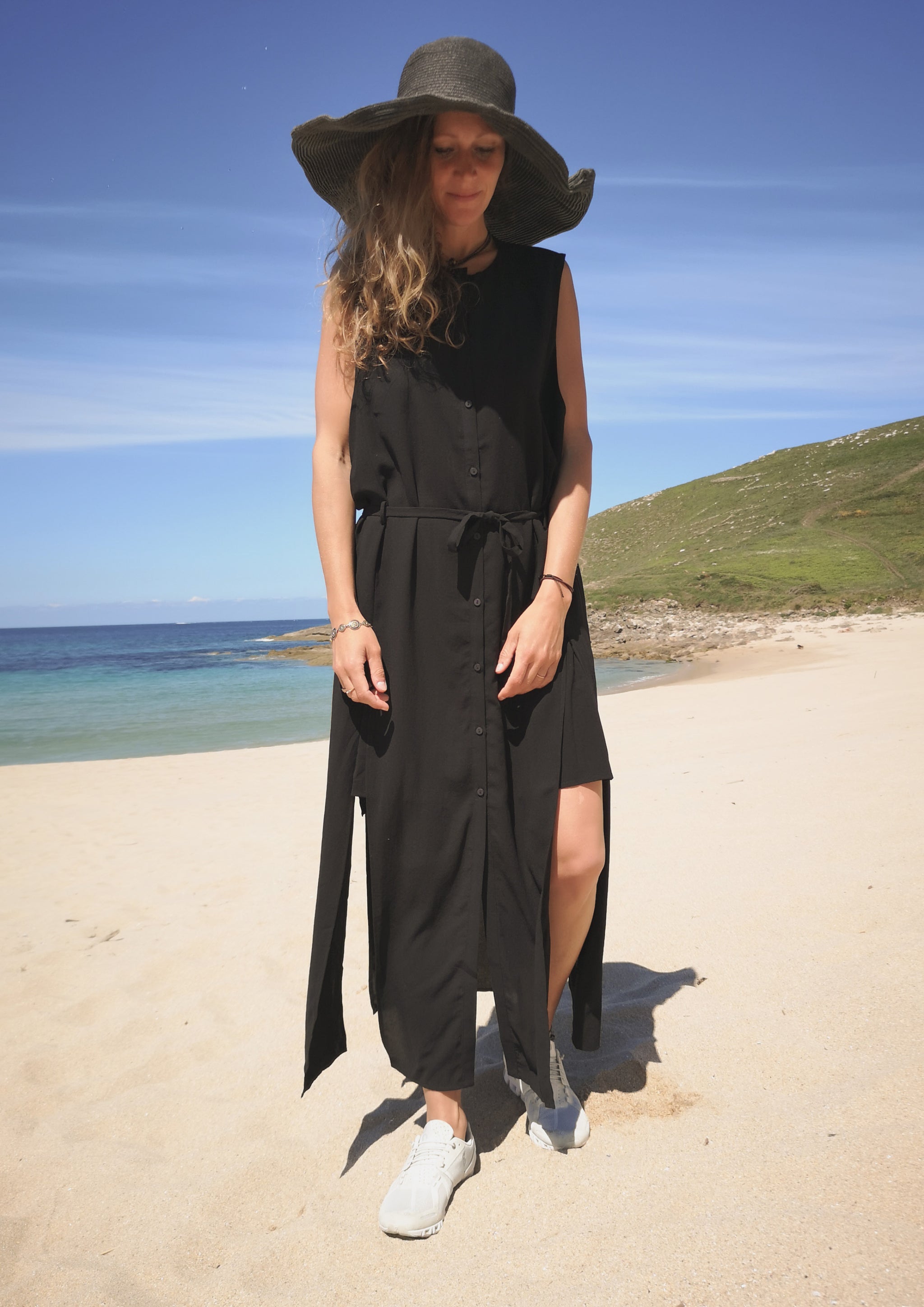 Long black sleeveless hot sale vest
